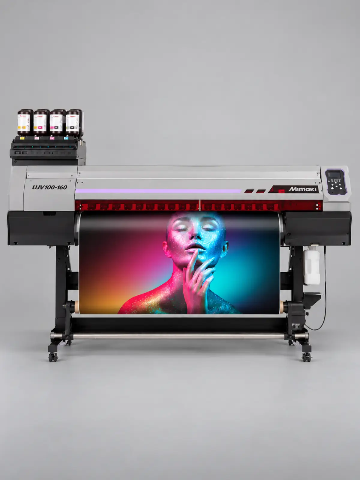 Impresora UV Mimaki UJV100-160 imprimiendo una imagen a color